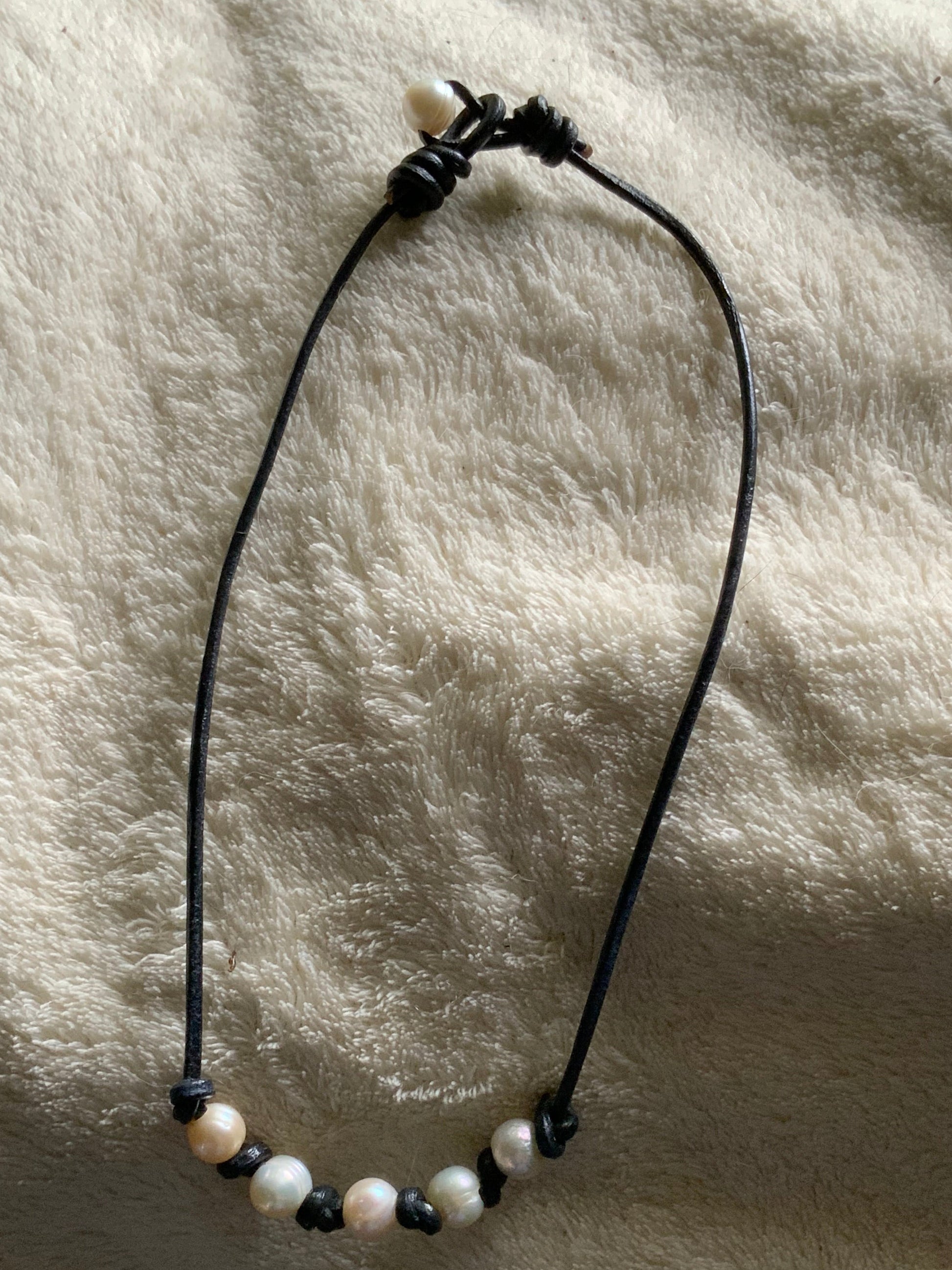 Black leather cord necklace with pearls